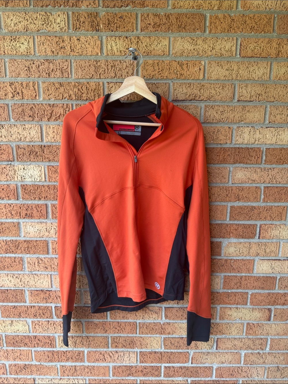 Novara Men’s Running Jacket Orange Black Thumb Holes Rear Pockets